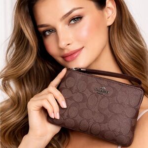 Coach signature metallic wristlet